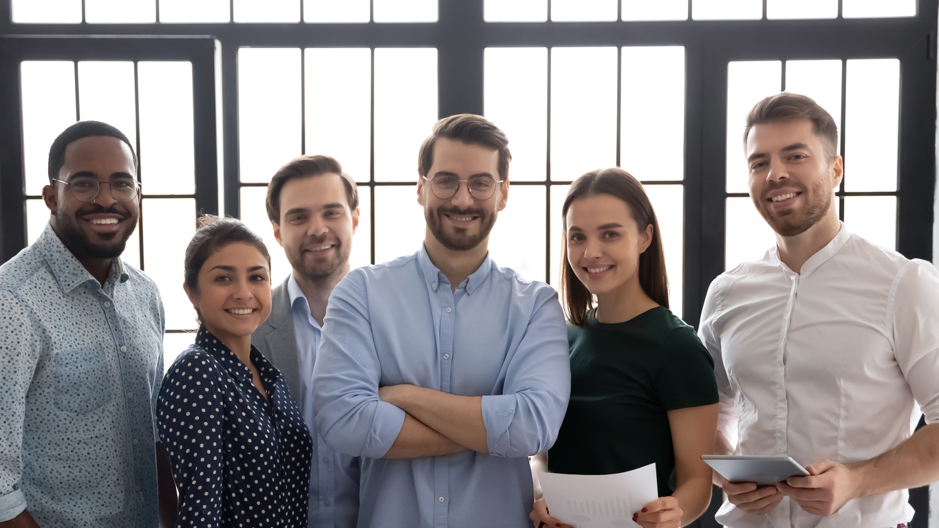 Group portrait of successful multiethnic business team in office