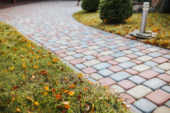 Backyard of a country house - stone walkways and landscaping